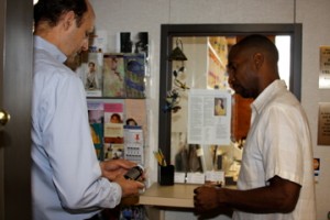 Dr. Mitchell talking with a patient about a nutritional supplement in Raleigh, N.C.